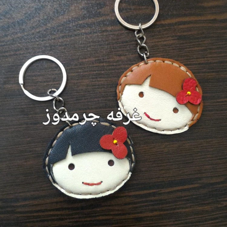 جاکلیدی چرم طبیعی گاو دخترک جاکلیدی چرم دست دوز