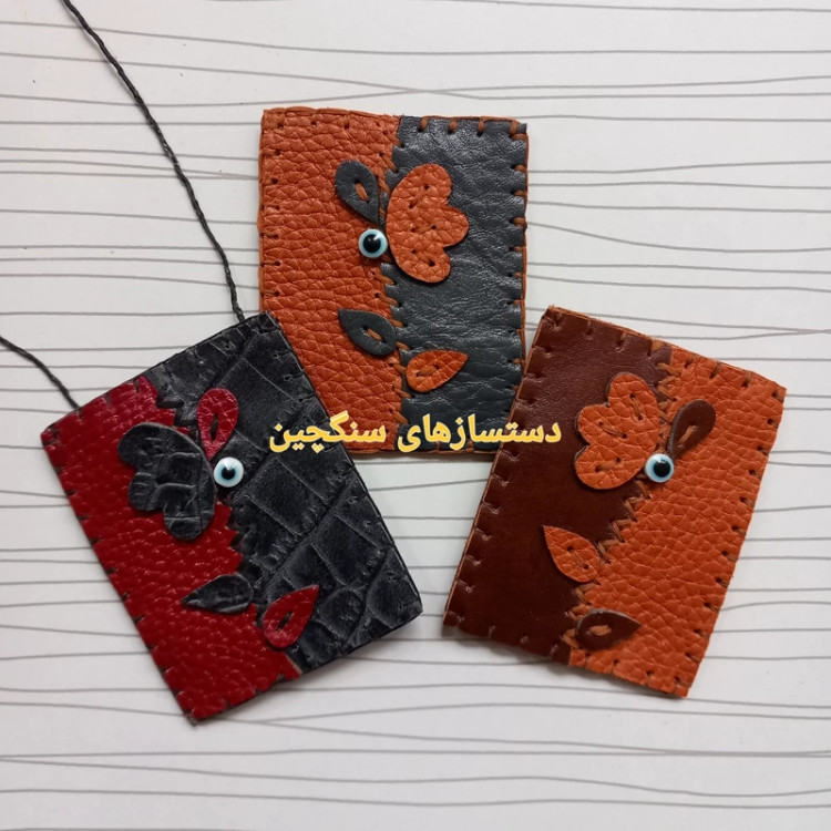 کیف دعا و حرز طرح گل چرم طبیعی با نگین چشم زخم (سایز داخلی 5 در 6 و نیم) کیف گردنی جاحرزی